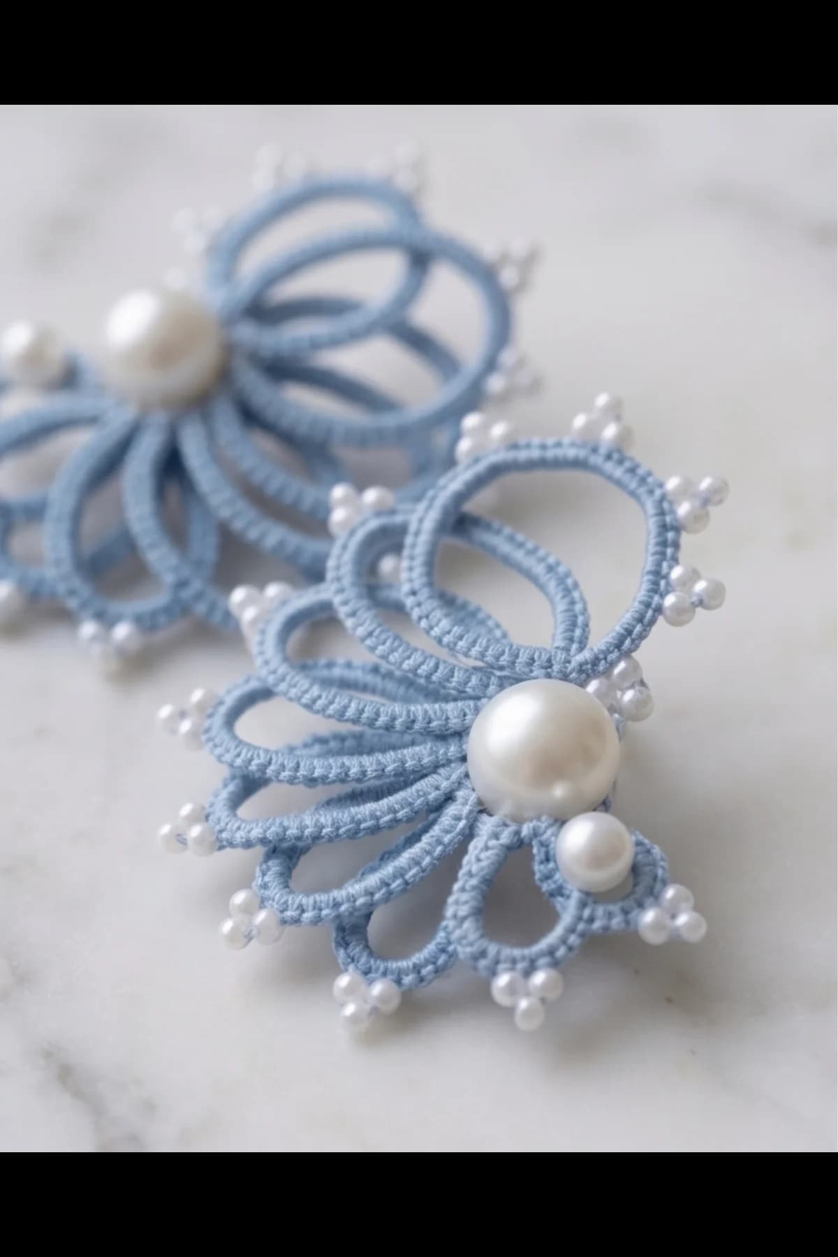 Hand knitted overlapped long studs