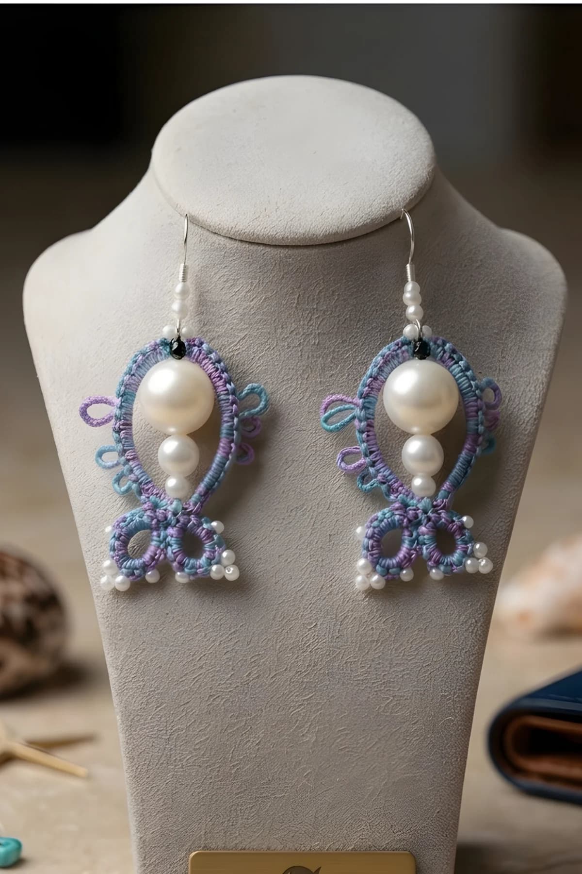 Hand knitted fish shaped long studs
