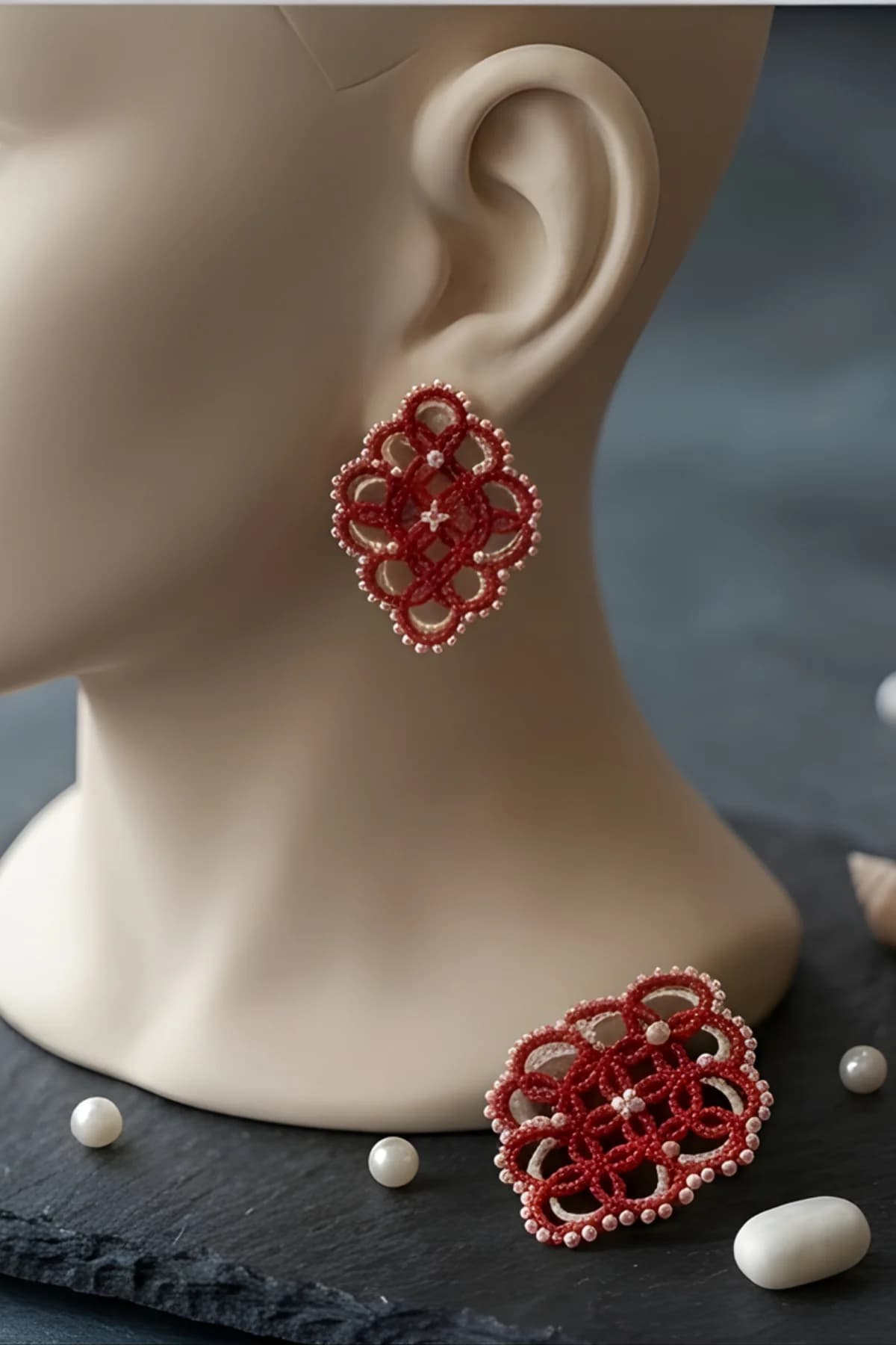 Hand knitted rombus shaped long studs